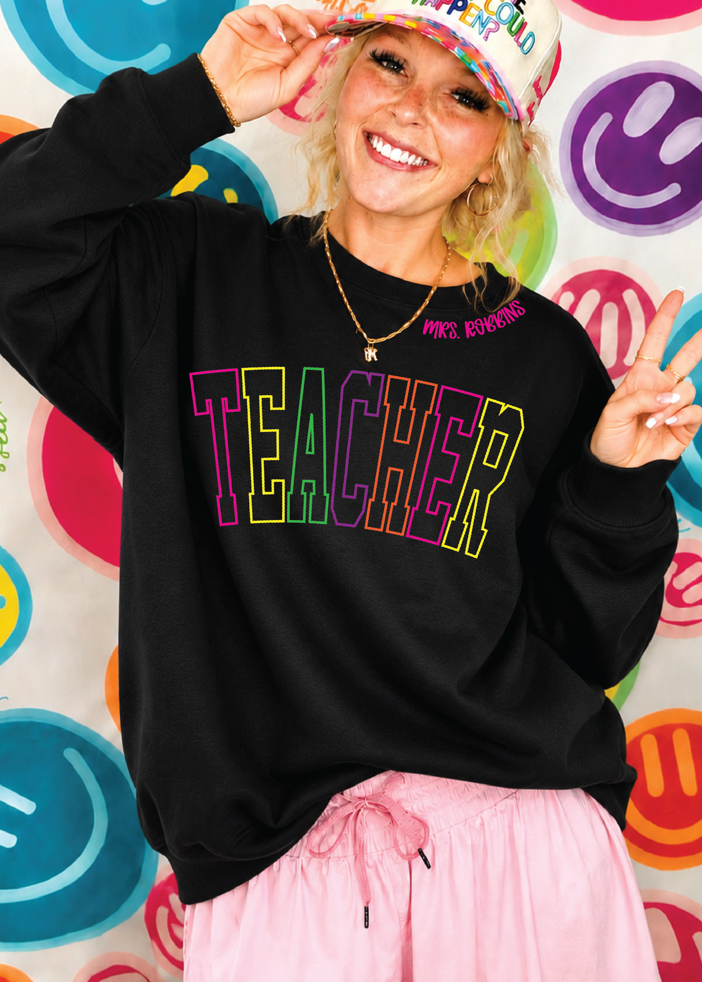 Teacher in Technicolor Sweatshirt